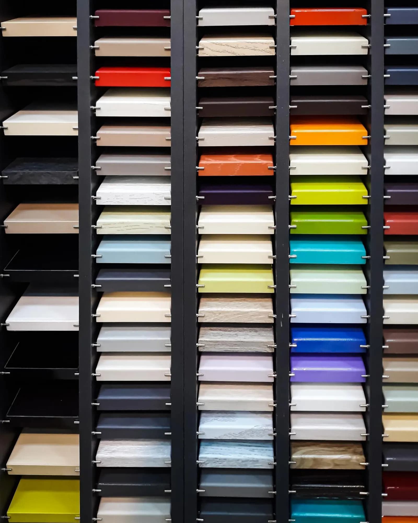 Paper samples and archive drawers in a materials library.