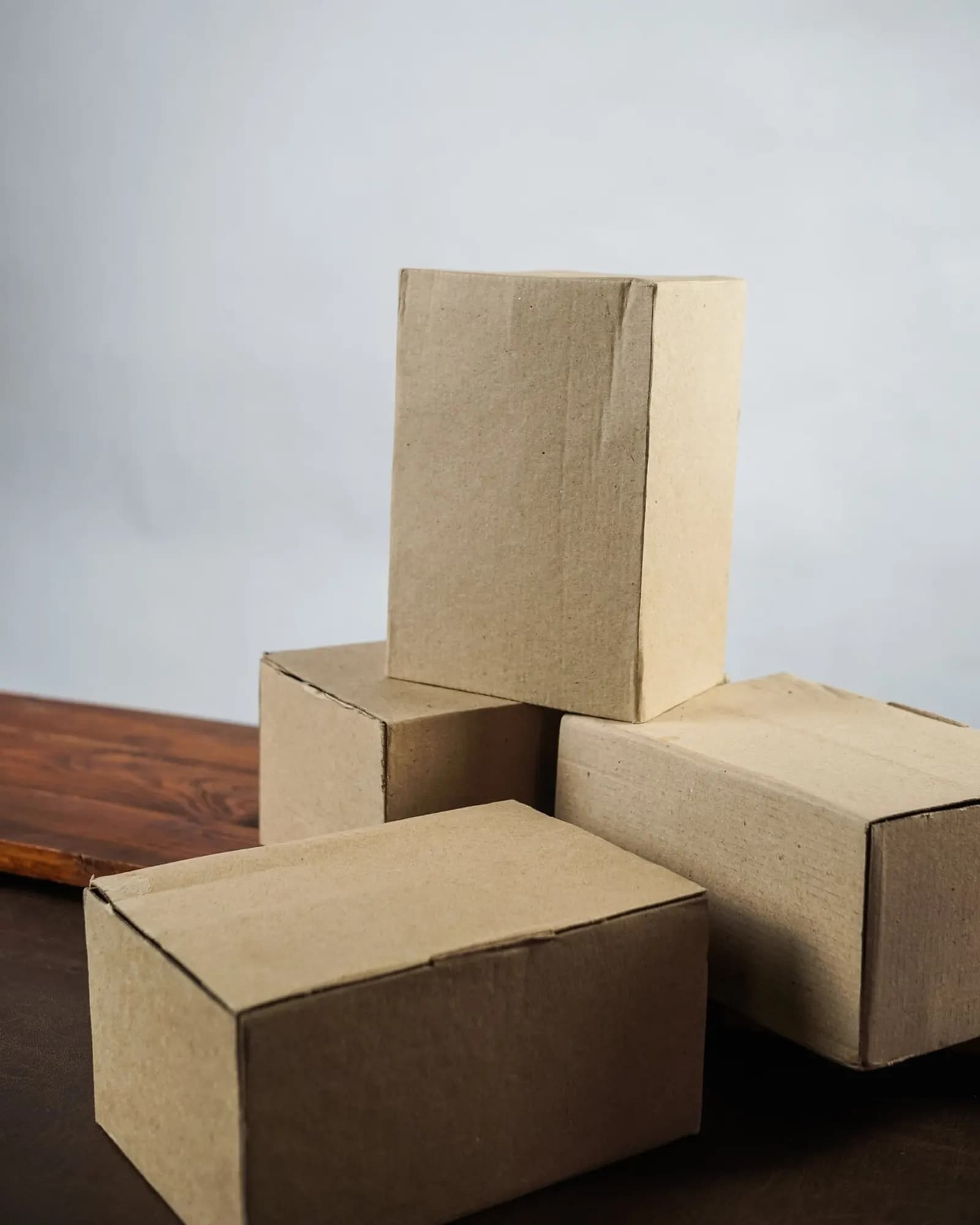 Packaging and kraft paper arranged on a packing table.
